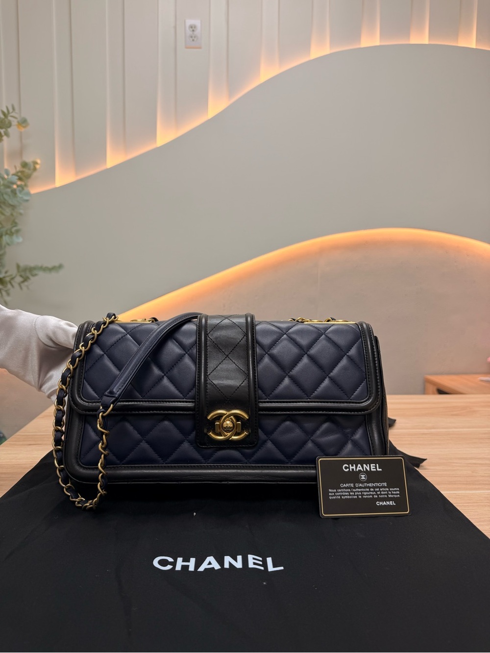 CHANEL Quilted Leather Shoulder Bag in Navy and Black with Gold Hardware